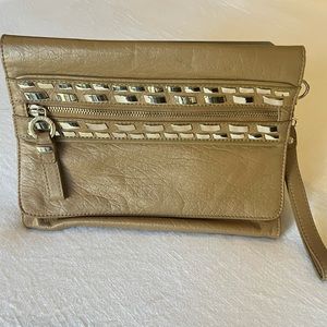 Tan leather clutch bag